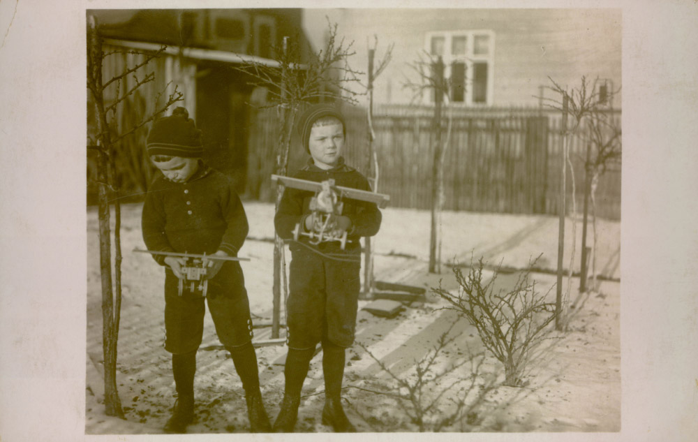 Brothers with aeroplane models